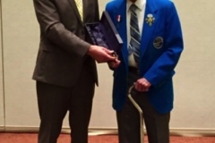 Ray_Dillard_accepting_Hall_Of_Fame_Induction_from_ANA_President2C_Jeff_Garrett_281329